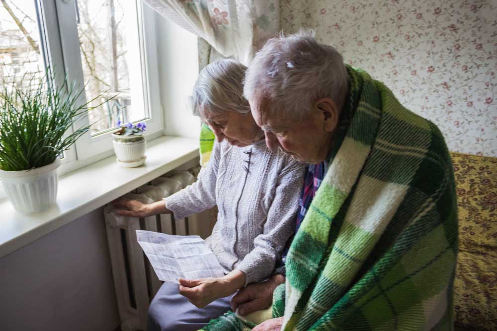 homeowner looking at utility bill