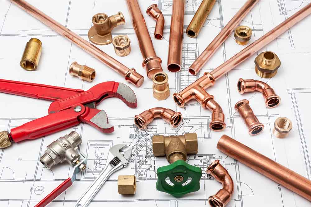 plumbing pipes and blueprint
