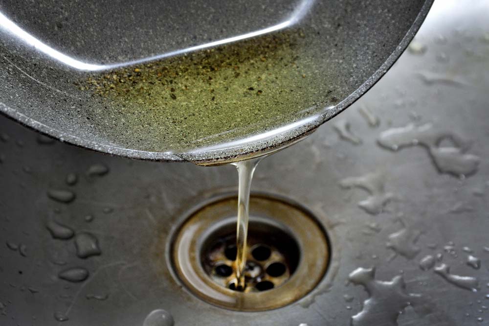 pouring cooking oil down the kitchen drain North Fort Myers, FL