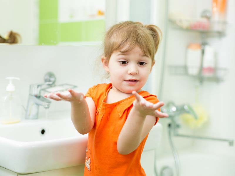 a kid in the bathroom